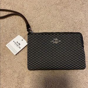 Coach wristlet with tags